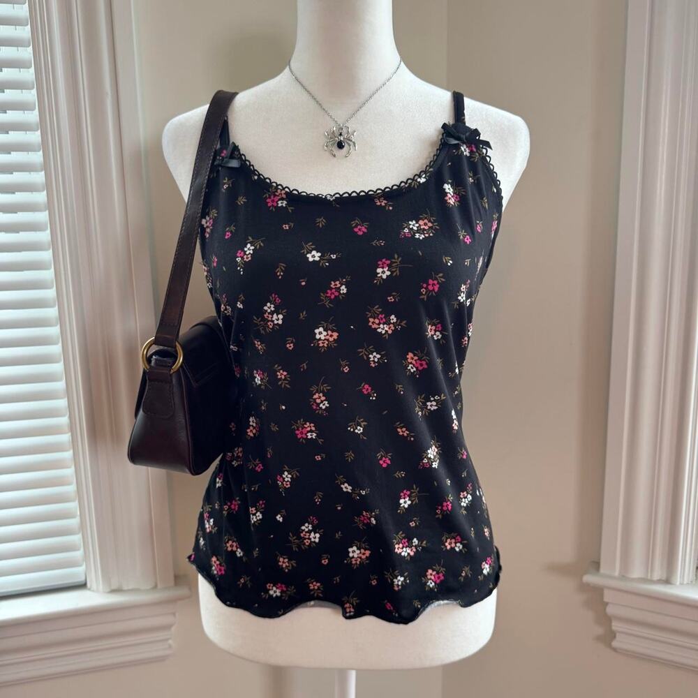 Black floral tank top with small pink and white flowers